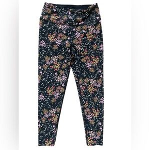 Victoria's Secret black fitted athletic leggings with floral and star print.